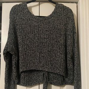 This Hollister sweater has cross detail in the back and it’s a little shorter.